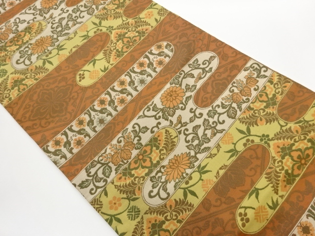 ヱ霞に華紋・菊桐唐草模様織出し開き名古屋帯（額縁仕立て）